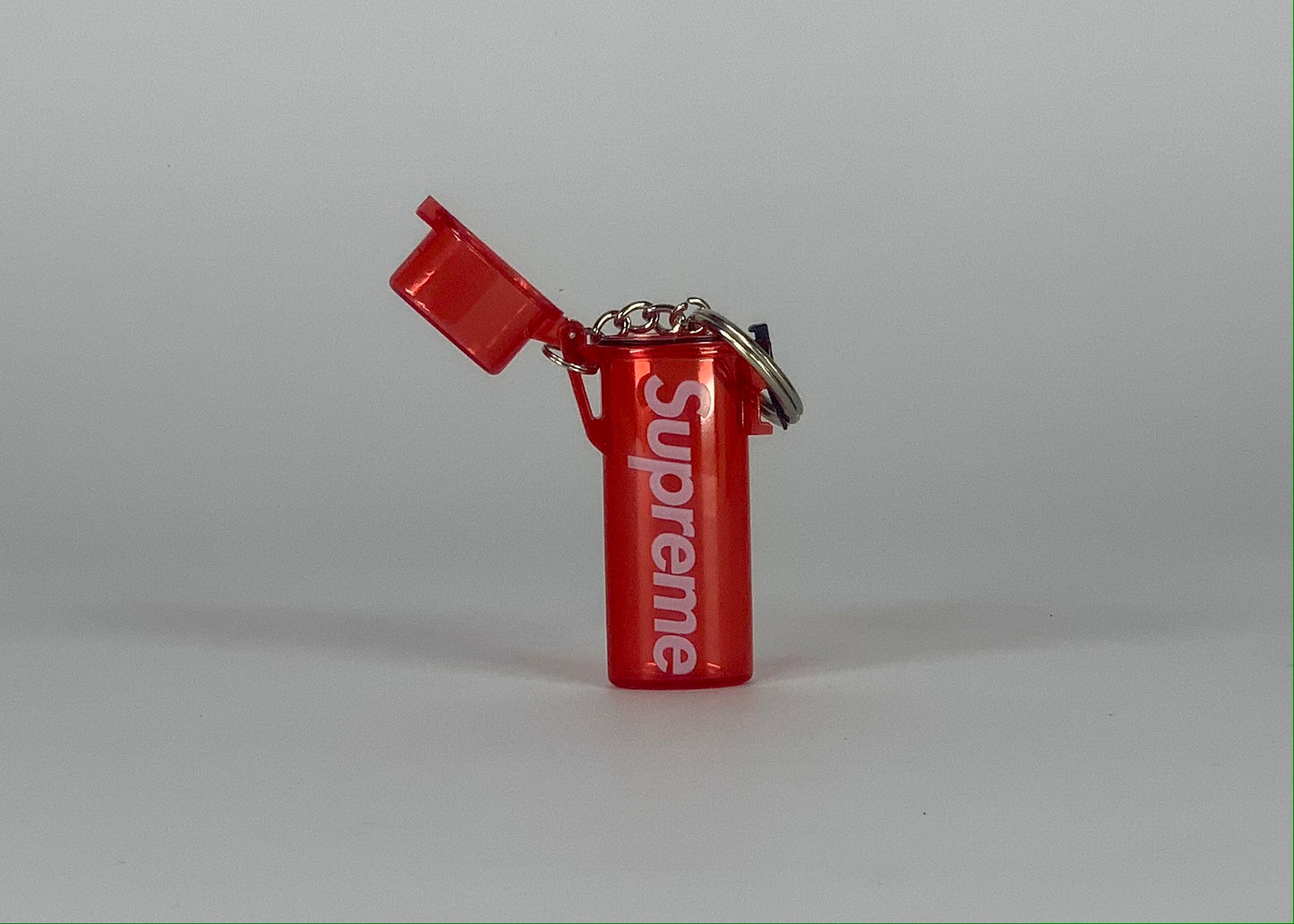 Supreme Waterproof Lighter Case Keychain Red