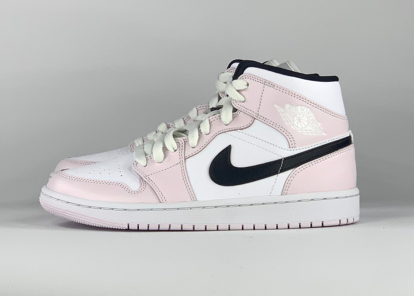 Jordan 1 Mid Barely Rose (W)