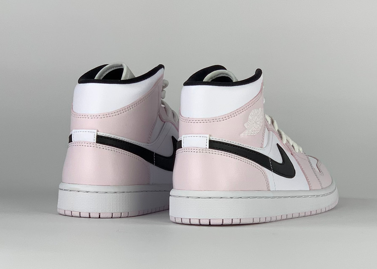 Jordan 1 Mid Barely Rose (W)