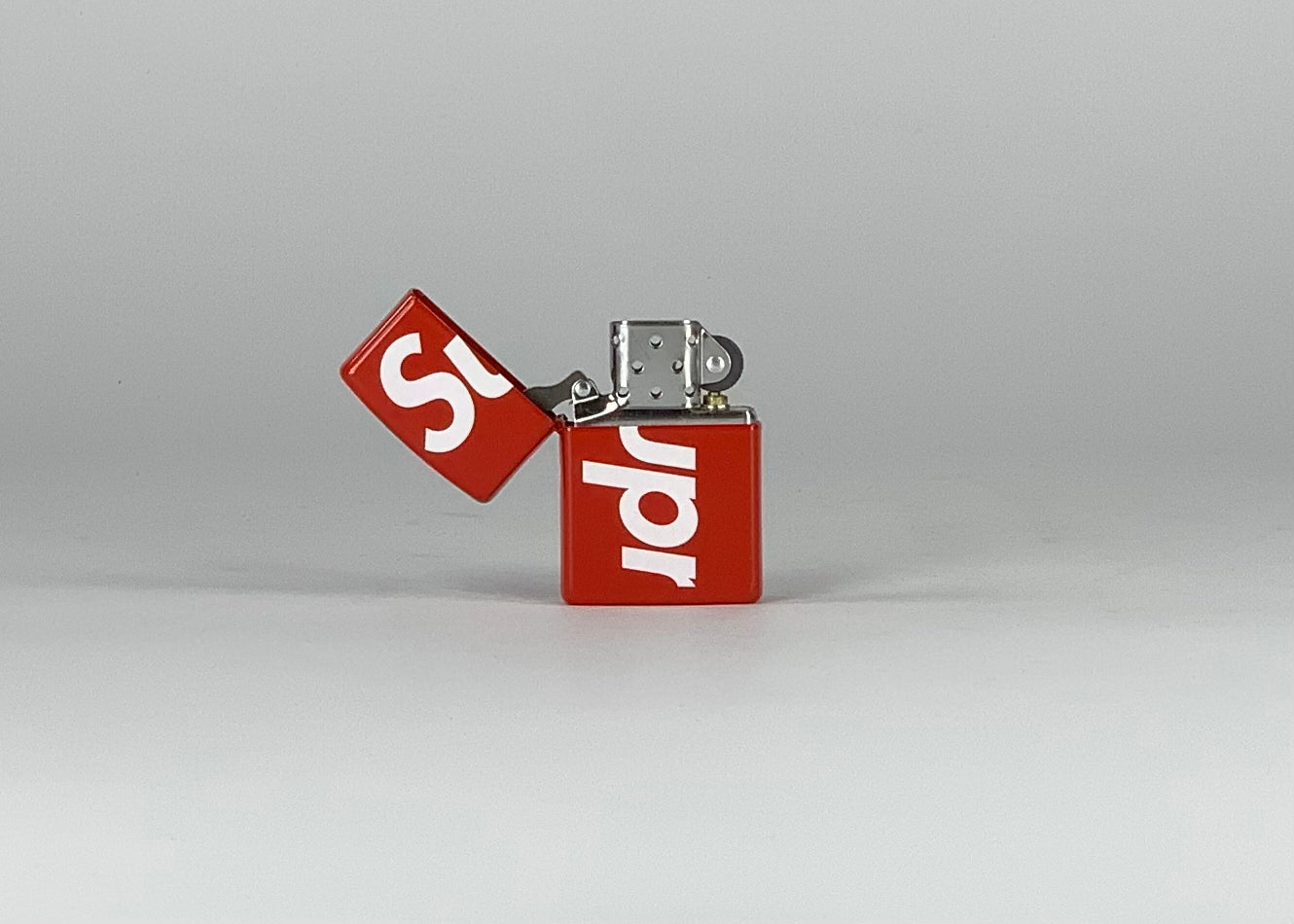 Supreme Logo Zippo Red